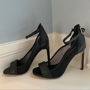 Elegant BCBGeneration Black Heel with Mesh Siding